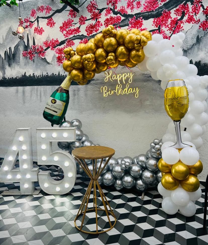 Champagne Forty Fifth Birthday Balloon Decor