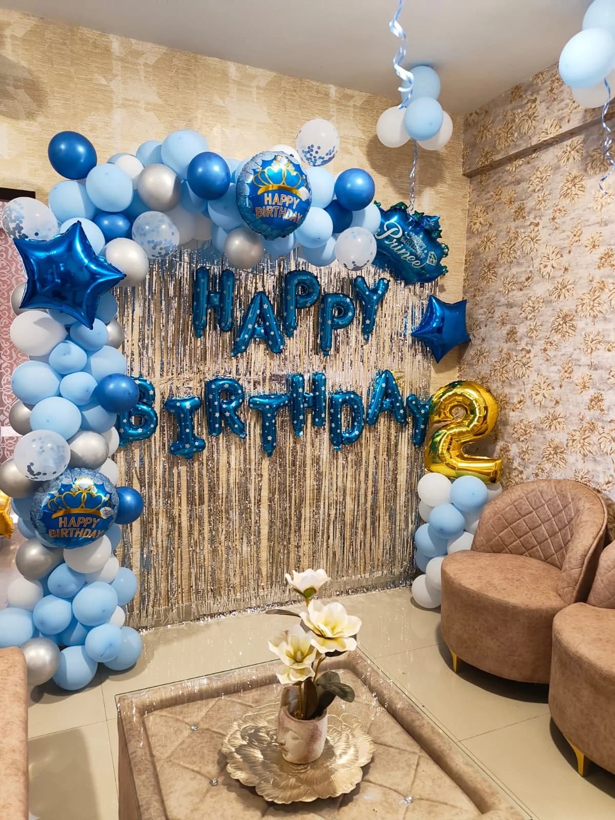 Prince 2nd Birthday Balloon Decoration With Blue White Arch And Silver Fringe Backdrop setup in Faridabad