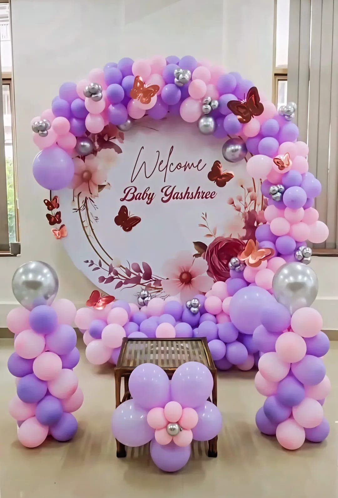 Welcome Baby Yashshree Pastel Butterfly Balloon Decor With Floral Backdrop