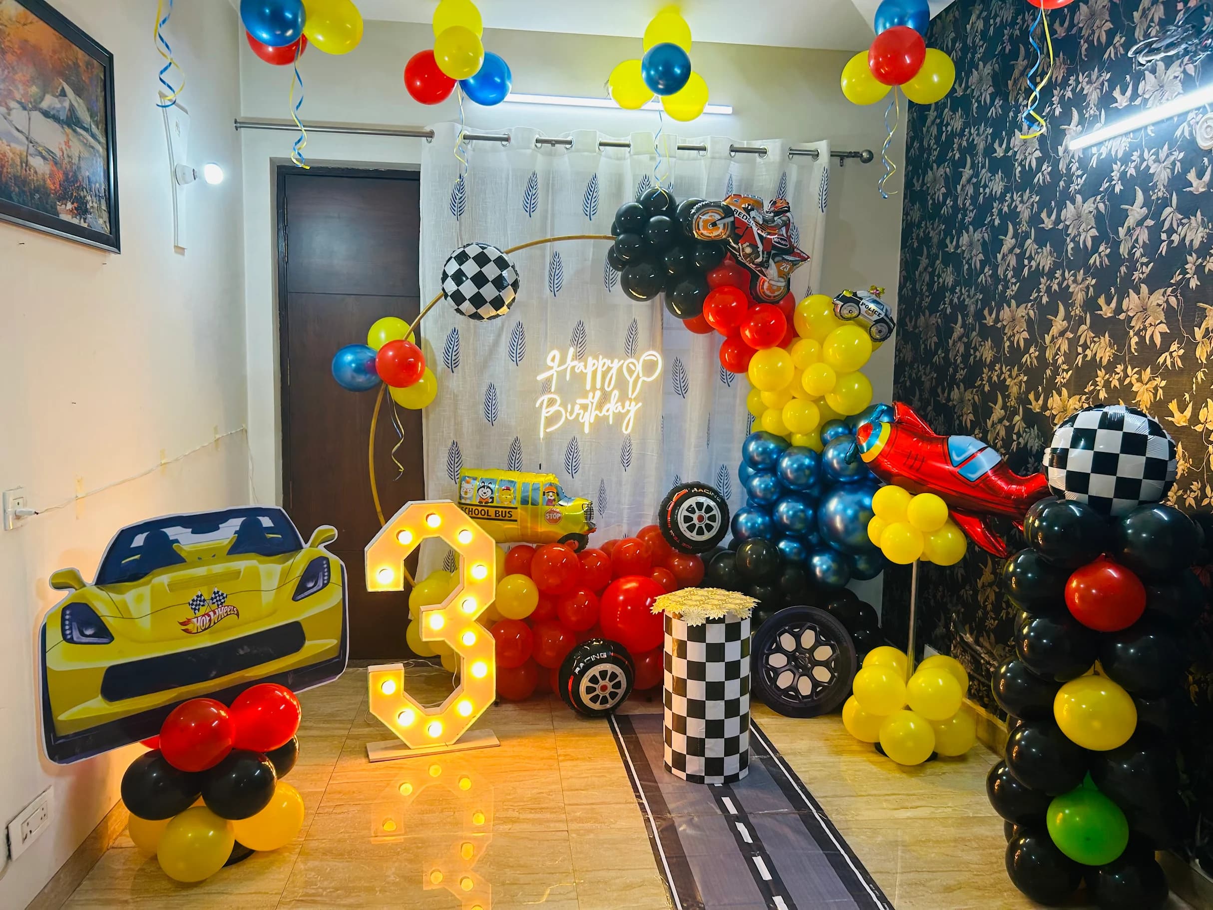 Birthday Racing Car Theme Balloon Decor With Red Yellow Blue Balloon Arch And Road Track Setup